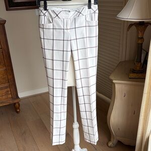 Express White pants with burgundy and black windowpane pattern.